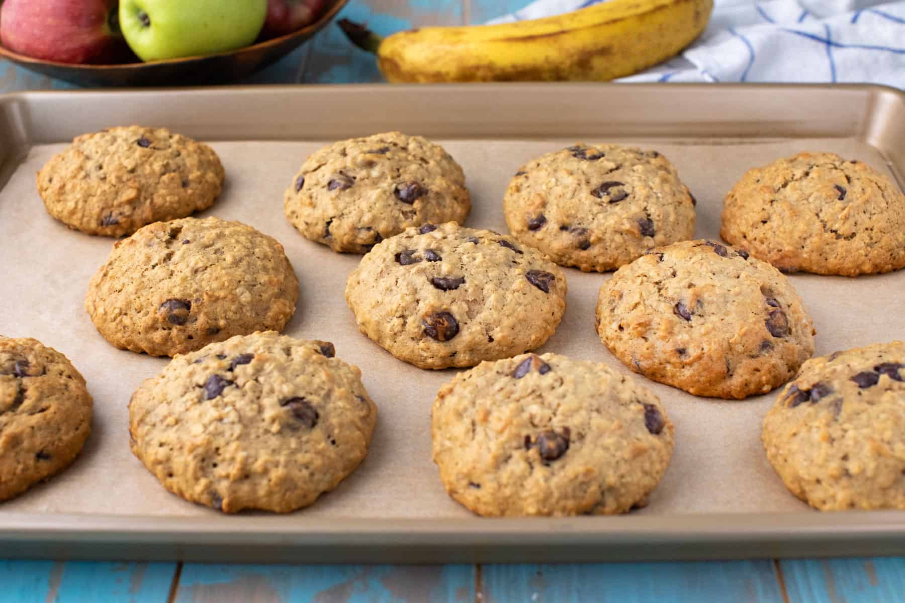 banana oatmeal chocolate chip cookies on a baking sheet