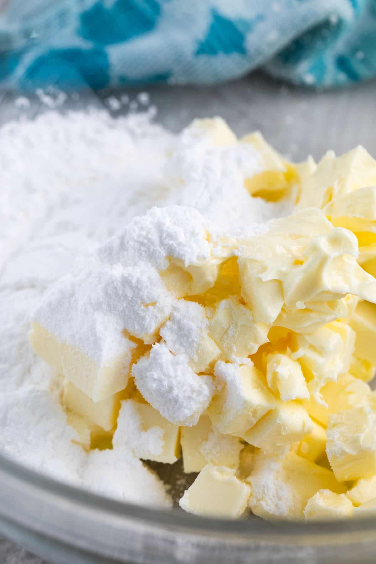 butter and powdered sugar in a bowl.