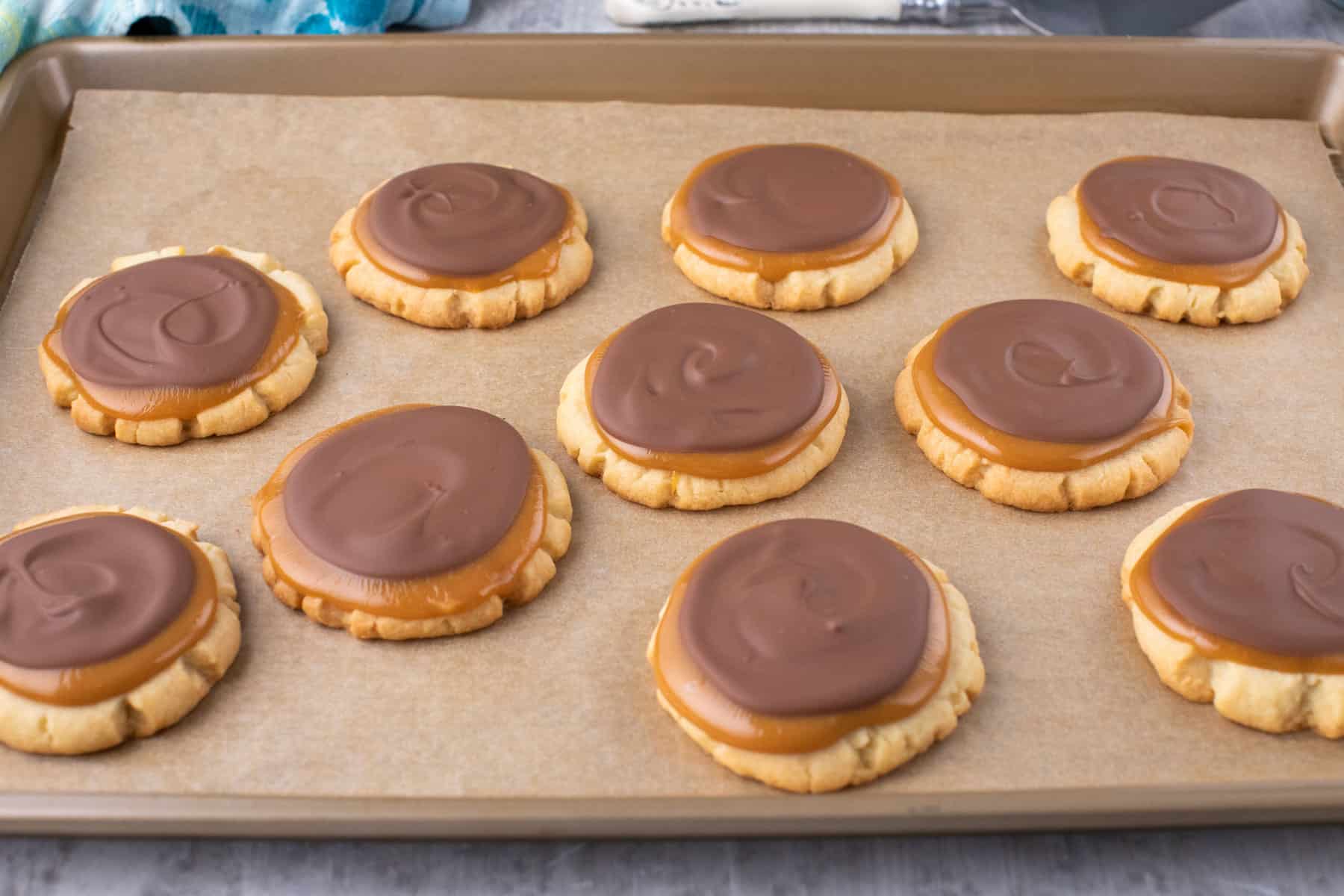 twix cookies on a cookies sheet.