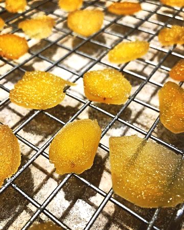 candied ginger after boiling,  cooling on rack