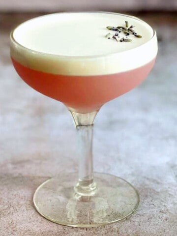 lavender-pisco-sour-in-a-coupe-with-dried-lavender-on-top