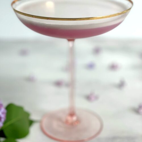 lilac beauty cocktail in a coupe