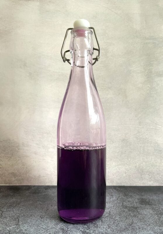 lilac syrup in a flip top bottle