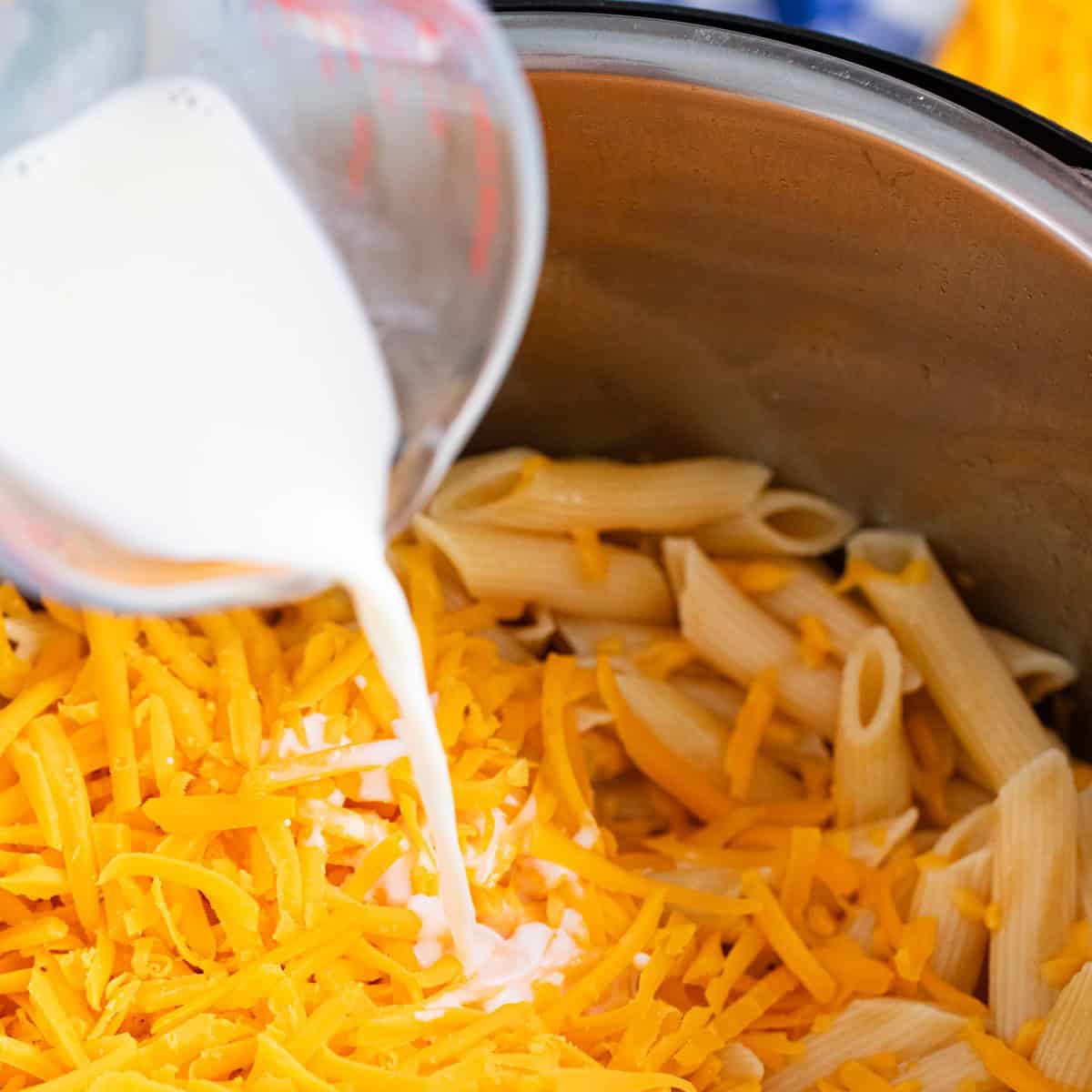 milk and cheese added to instant pot mac and cheese.