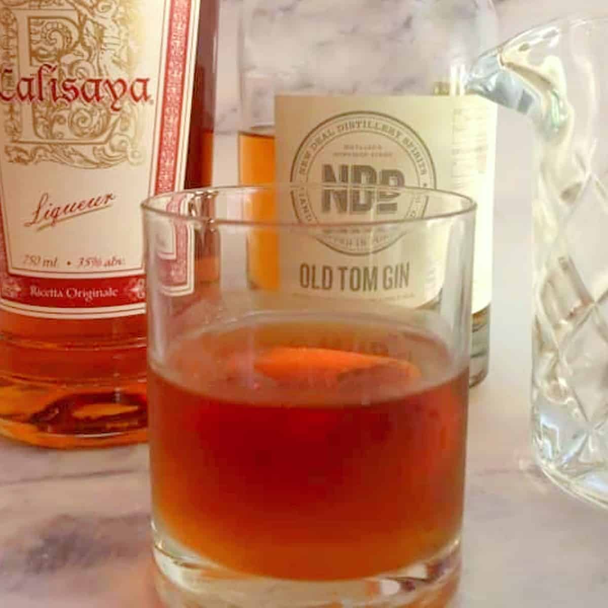 modern-negroni-with-old-tom-gin-calisysa-and-mixing-glass-with-spoon