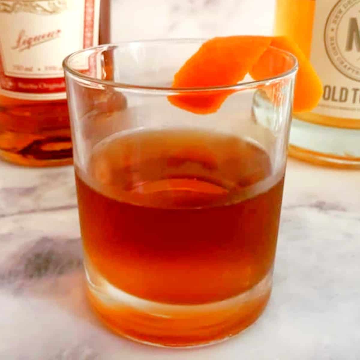 modern-negroni-with-orange-peel-old-tom-gin-and-calisaya-liquor