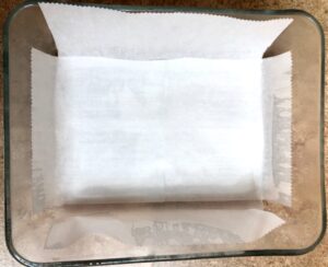 pan prepared with non stick spray and parchment paper