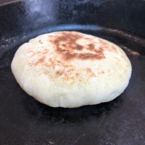 pita cooking on hot pan
