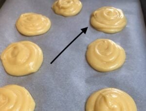 puff pastry piped for baking cream puffs