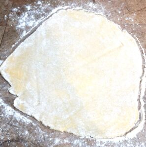 rolled out cherry tart crust dough before baking
