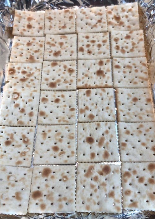 saltines in a pan for saltine caramel bars