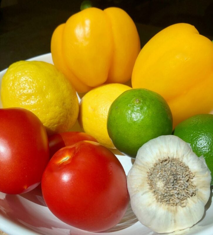 fresh vegetables and fruit in a bowl