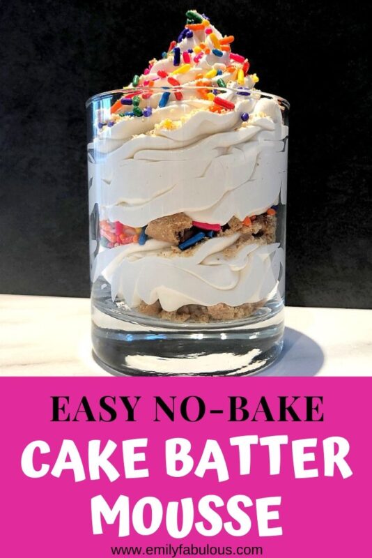 no- bake cake batter mousse swirled in a jar with crushed graham crackers and sprinkles
