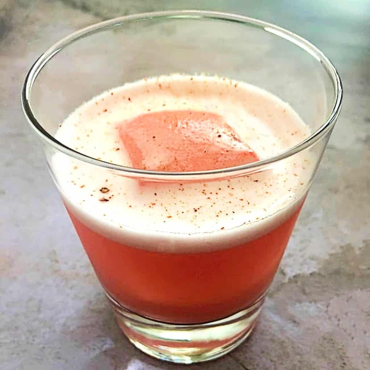 tequila sour cocktail with campari and egg white
