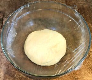 homemade pizza crust after rising