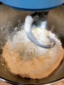 easy pizza dough in stand mixer before kneading