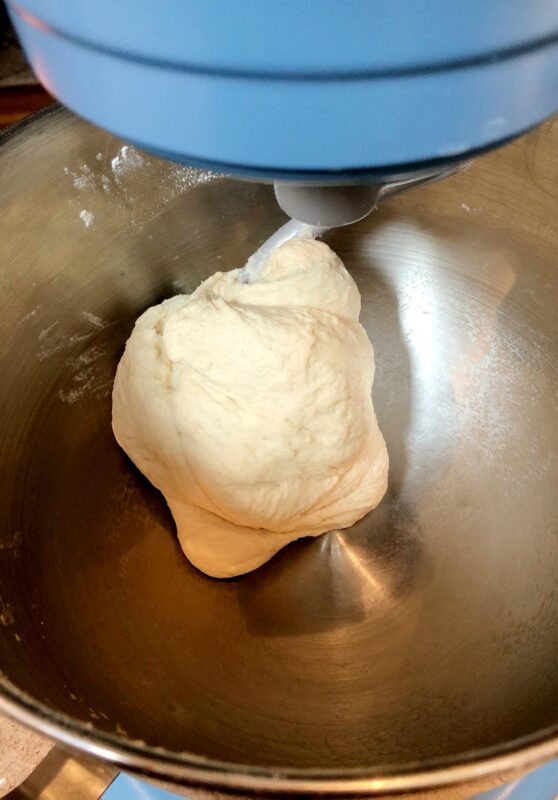 easy pizza dough in stand mixer on dough hook