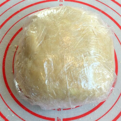 pie crust discs wrapped in plastic wrap