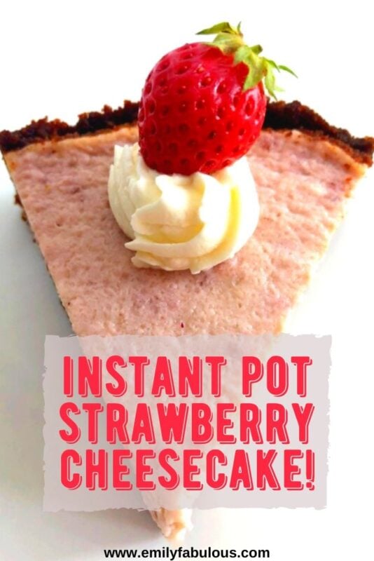 a slice of strawberry cheesecake with whipped cream and a fresh strawberry on top