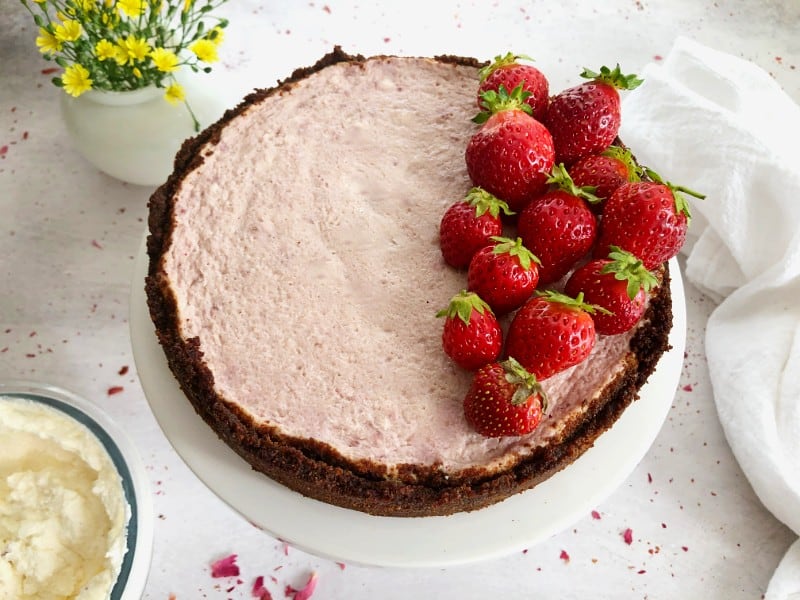 instant pot strawberry cheesecake with fresh strawberries on top