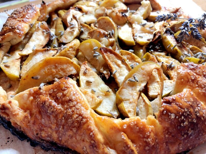 close up of apple lavender galette with dried lavender buds, a quick and easy pie apple dessert recipe 