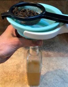 funnel and strainer for honey lavender syrup