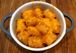 tots with cheese melted on top
