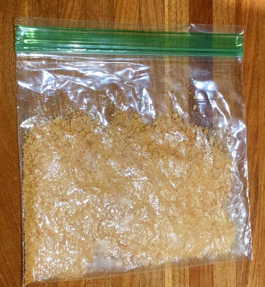 crushed graham crackers in a plastic bag.