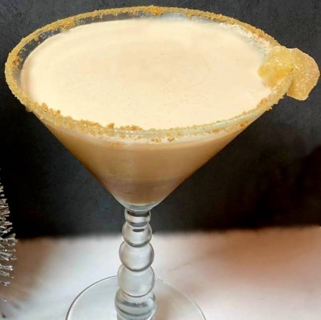 gingerbread martini with a candied ginger garnish