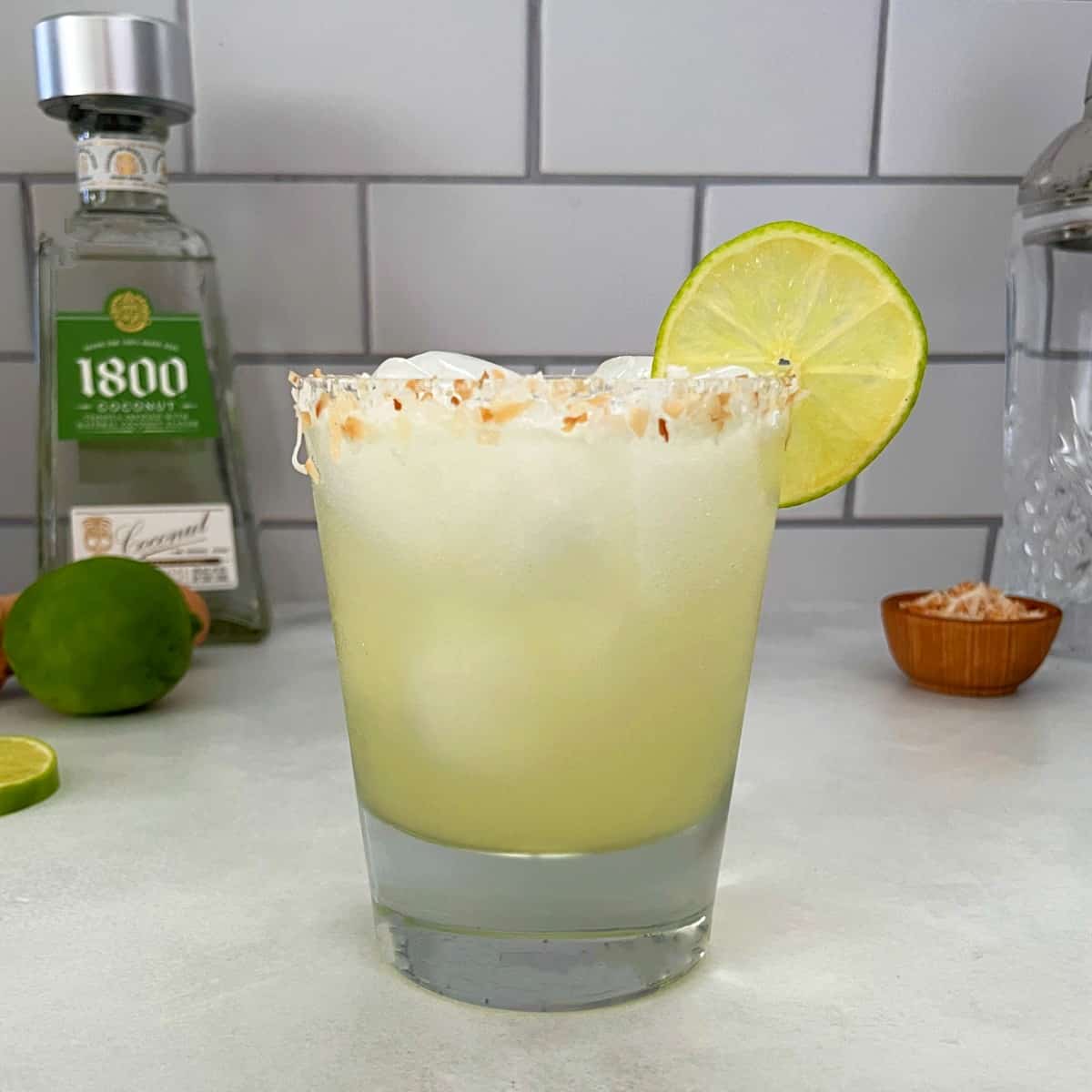 coconut and lime margarita with toasted coconut rim.