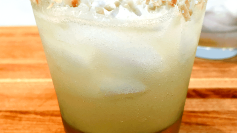 coconut tequila margarita with lime wedge