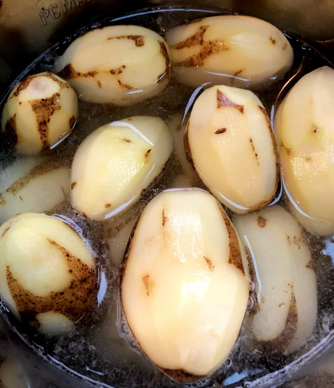 peeled potatoes in water in instant pot.