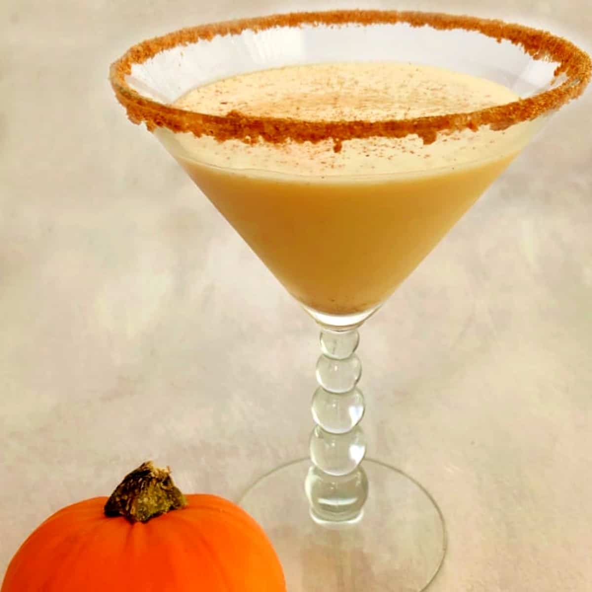 pumpkin spice martini in a martini glass