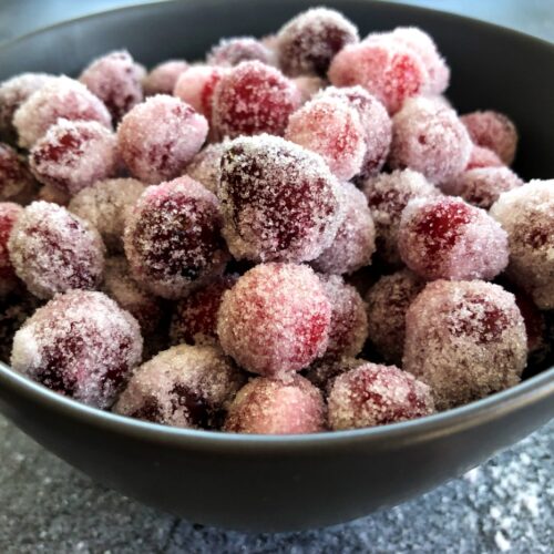 boozy candied cranberries in a bowl