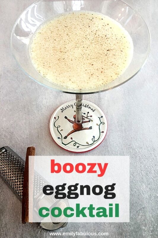 eggnog cocktail in a martini glass with alcohol and fresh nutmeg