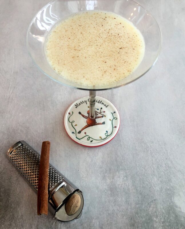 eggnog cocktail in a martini glass