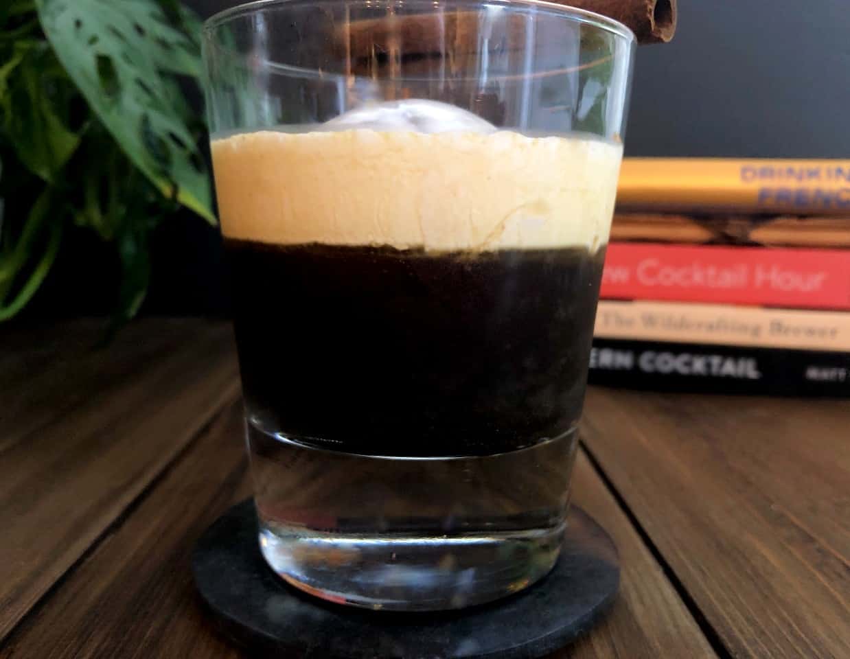 gingerbread white russian with cinnamon stick on top.