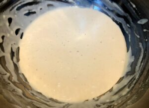 yeast, flour and water after resting for pitas