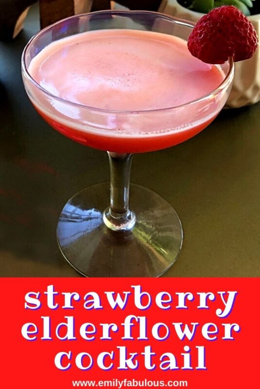 Strawberry Elderflower Cocktail with egg white foam and a strawberry garnish