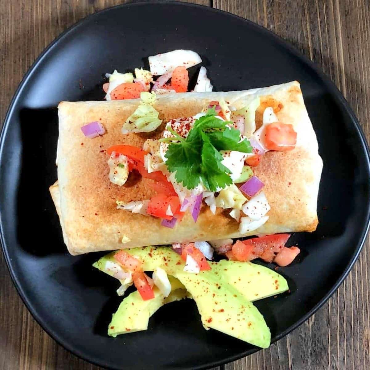 air fried chimichanga on a plate.