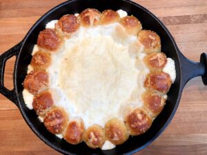 baked cheese dip and pretzels