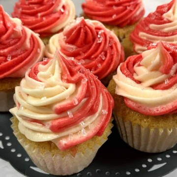 candy cane cupcakes swirled with peppermint buttercream frosting
