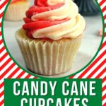 swirled peppermint frosting on top of a candy cane cupcake