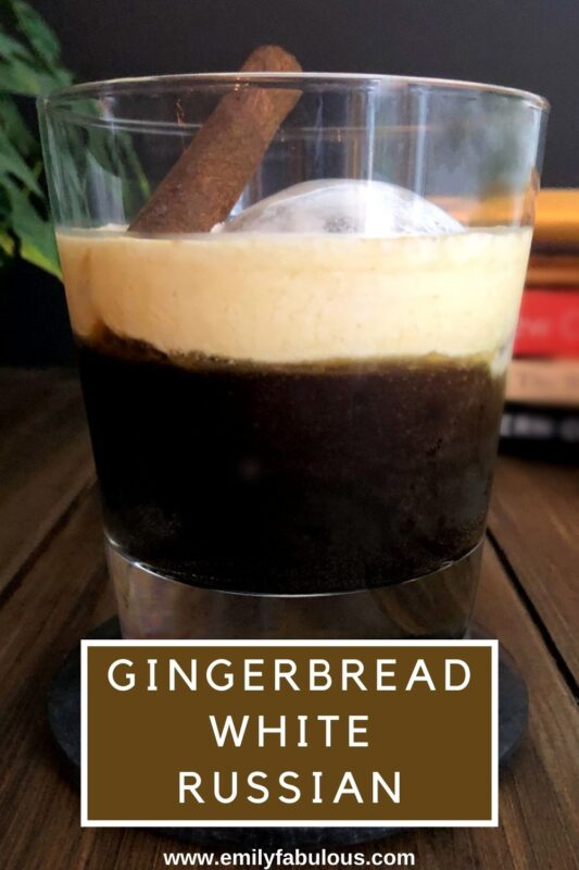 gingerbread white russian cocktail in a glass with a cinnamon stick garnish