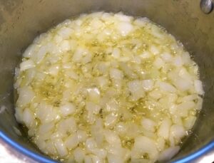 onions cooking in butter in a pan