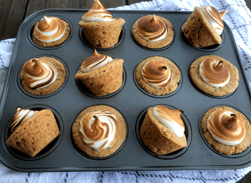 s'mores cups in a cupcake pan on a table
