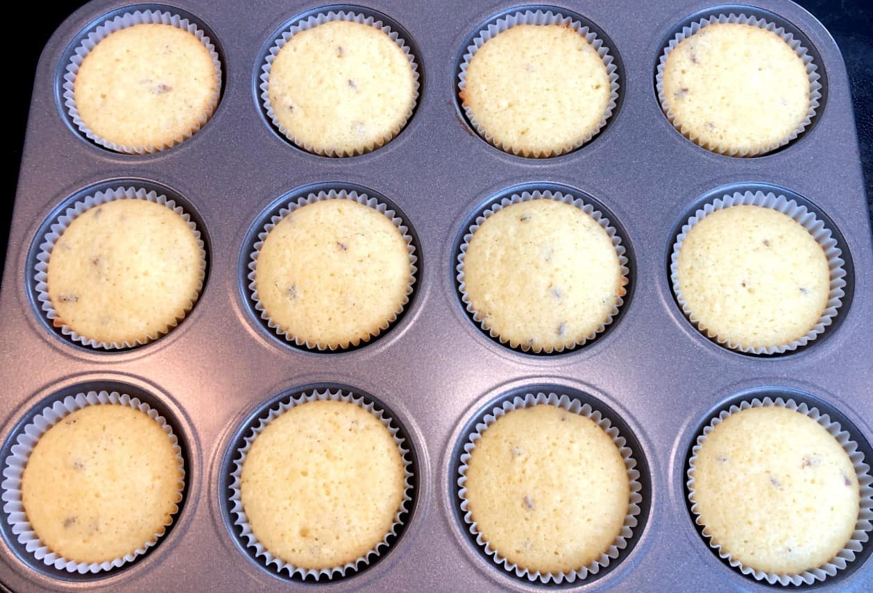 baked lemon lavender cupcakes in a cupcake pan