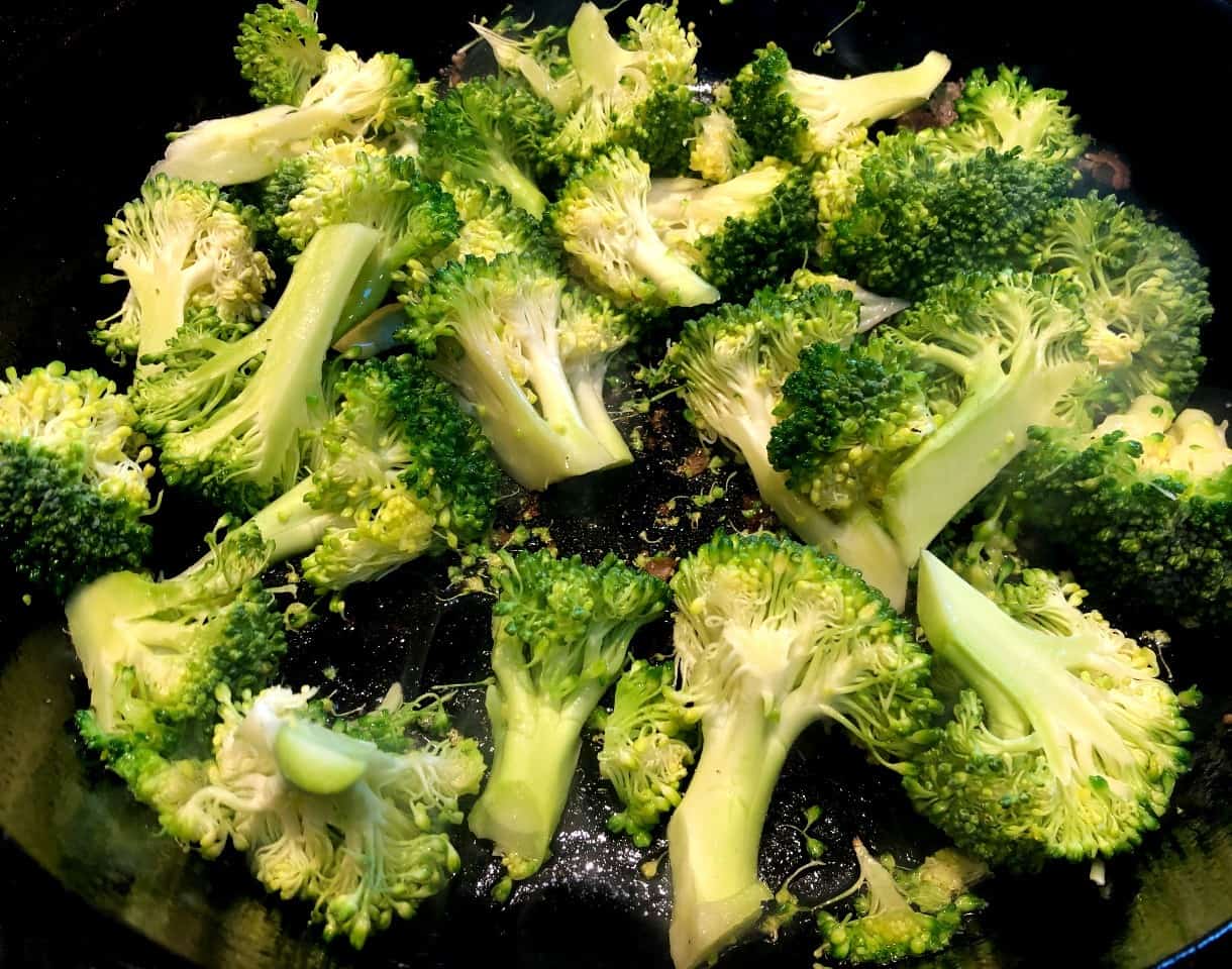 broccoli in a cast-iron pan.