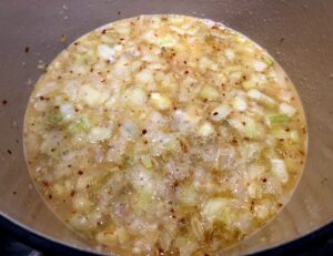 fennel, onion and seasoning in a pot