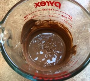 melted chocolate chips in a glass cup